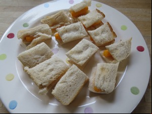 Sandwich split into 12 individual Wotsits mini-sarnies