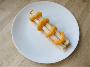 Corn snacks threaded over white bread