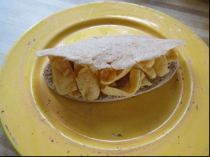 Quavers in a pitta bread on a plate