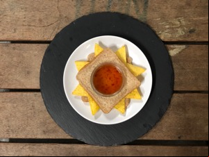 Artistic overhead view of Doritos in brown bread