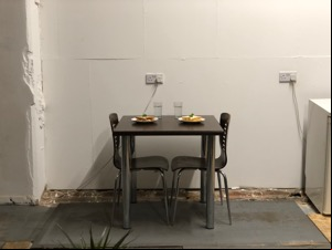 Distant view of crisp sandwiches on a dinner table