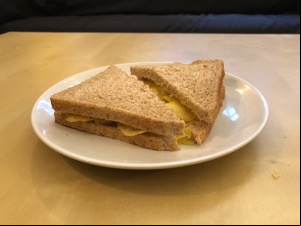 Brown bread containing potato crisps
