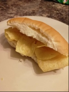 Close up of crisp-filled white finger roll