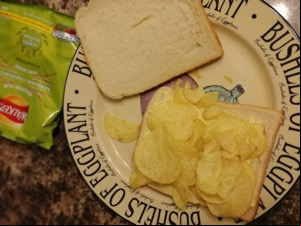White crisp sandwich with lid off and bag alongside