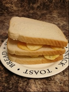 Double decker white bread potato crisp sandwich