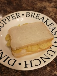 White crisp sandwich on a typographic plate