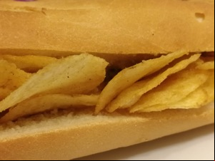 Extreme close up of crisp-filled baguette